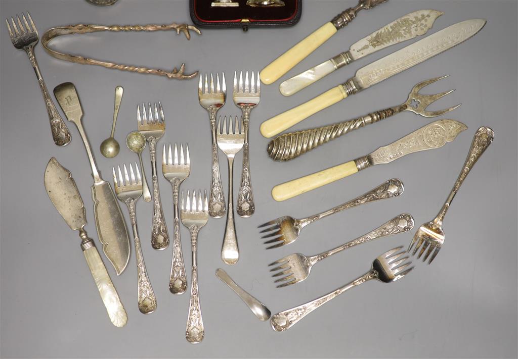 A cased pair of Victorian silver peppers, Sheffield, 1891, 79mm, five other silver condiments, etc.